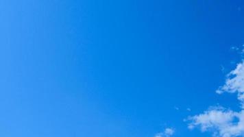 Sunny weather. Blue sky and white clouds. Clouds against blue sky background. photo