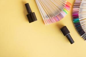 Flat lay manicure tools on a colored background with copy space photo