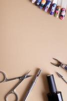 Manicure tools and tips with copy space drawings photo