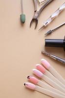 Manicure tools and tips with copy space drawings photo