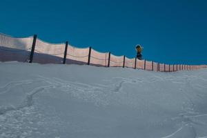 Cannon artificial snow on the track photo