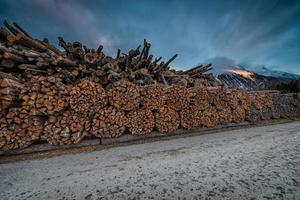 stacked wood mountain photo
