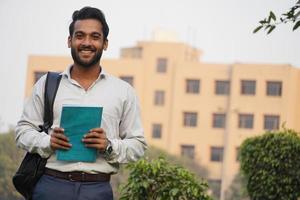 Student standing outside of school photo