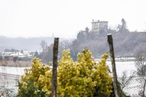 First snow on the hill towns. Between autumn and winter photo