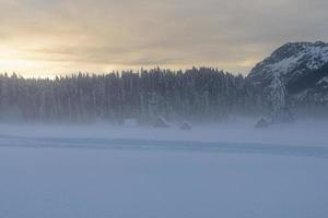 After the snowfall. Last lights of the twilight in Sappada. Magic of the Dolomites photo