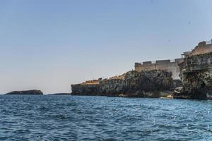 Polignano a Mare seen from the sea photo