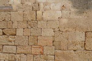 Texture of ancient masonry walls in Rhodes island in Greece photo