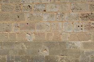 Texture of ancient masonry walls in Rhodes island in Greece photo