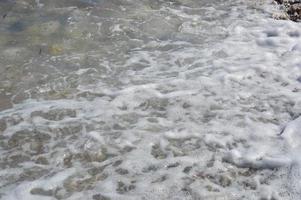 Textura de agua de mar egeo en Grecia foto