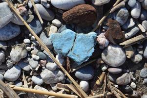 Pebble texture on the Aegean coast in Greece photo