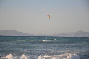 THEOLOGOS, RHODOS, GREECE - SEPTEMBER 16, 2021 Kitesurfing in the Aegean Sea