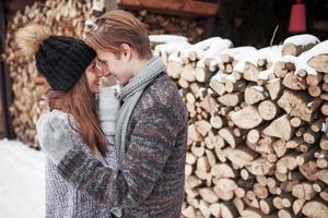 Happy Young Couple in Winter Park having fun.Family Outdoors. photo