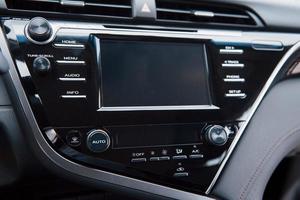 View of the interior of a modern automobile showing the dashboard photo