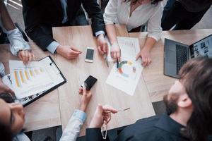 Working environment and discussion of a new project. Concept picture of economy, and money photo