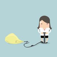 Businesswoman pumps up a balloon of a light bulb. vector