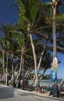 bolabog beach view with surfboard in boracay island philippines photo