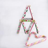 Tower of colorful chocolates and  candy canes with heart shape photo