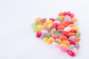 Colorful and tasty heart of candies photo