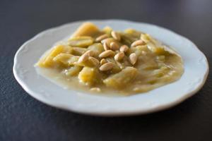 Homemade delicious thistle with almonds, a typical Christmas dish photo