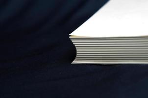 The process of book binding. Raw book without covers photo