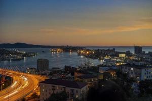 Urban landscape with a view of the Golden Bridge. Vladivostok, Russia photo