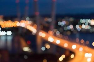 Abstract blurred background of night city photo