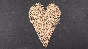 Uncooked black eyed peas. Health food concept. photo