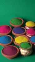 Colourful rangoli for Diwali festival in bowls photo