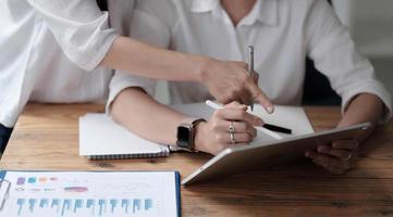 Close up Business people meeting to discuss the situation on the market. Business Financial Concept photo