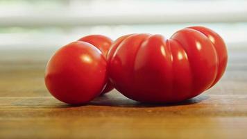 Tomatoes on the table with camera on slider motion