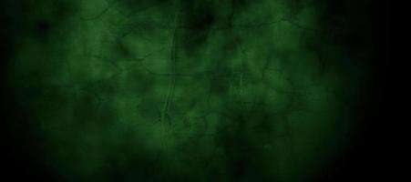 Scary dark green misty cracked wall for background photo