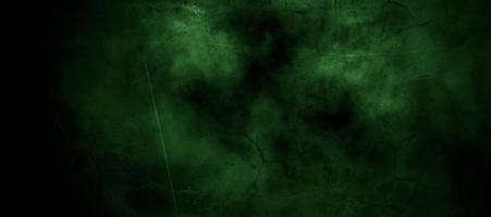 Scary dark green misty cracked wall for background photo