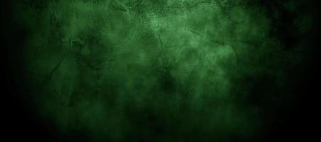 Scary dark green misty cracked wall for background photo