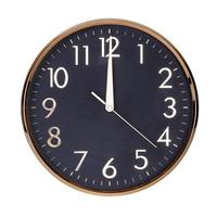 Noon on the dial of the round clock photo