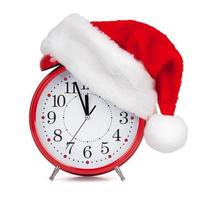 Hat Santa Claus put on a alarm clock photo