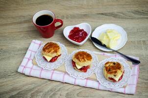 Homemade set of scone desserts and coffee photo