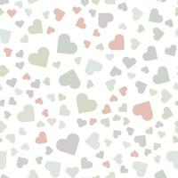Seamless vector pattern with multi-colored hearts in pastel colors.