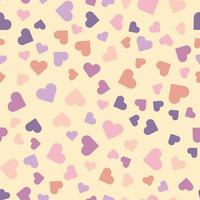 Seamless vector pattern with multi-colored hearts in pastel colors.