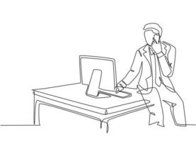 Single continuous line drawing of young business man sitting on desk staring on computer screen and holding a phone calling his staff. Business talk concept one line draw design vector illustration