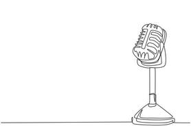 One single line drawing of retro old classic radio microphone for broadcasting. Vintage loudspeaker announcer item concept continuous line draw design vector graphic illustration