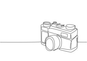 One continuous line drawing of old vintage analog pocket camera, side view. Retro classic photography equipment concept single line graphic draw design vector illustration