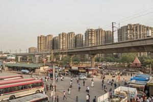 Big traffic TukTuks, buses and people New-Delhi, Delhi, India photo