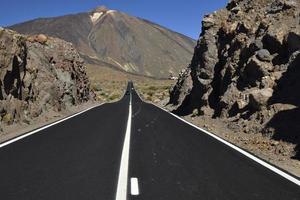 Road to Teide volcano trough lava stone photo