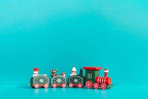 Christmas train on a blue background, Merry Christmas Concept photo