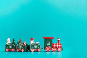 Christmas train on a blue background, Merry Christmas Concept photo