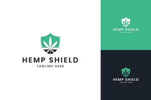 diseño de logotipo de espacio negativo de escudo de cannabis vector