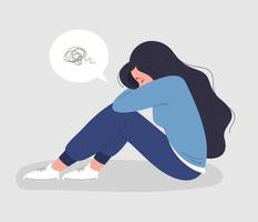 Depressed woman sitting with her head down vector