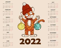 Calendar design template for 2022, the year of the tiger according to the Chinese or Eastern calendar, with an illustration of the tiger. Horizontal table with calendar for 2022. Vector