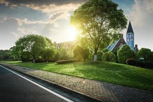 Beautiful modern house in cement, view from the garden. photo