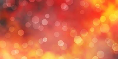 Light Orange vector background with spots.